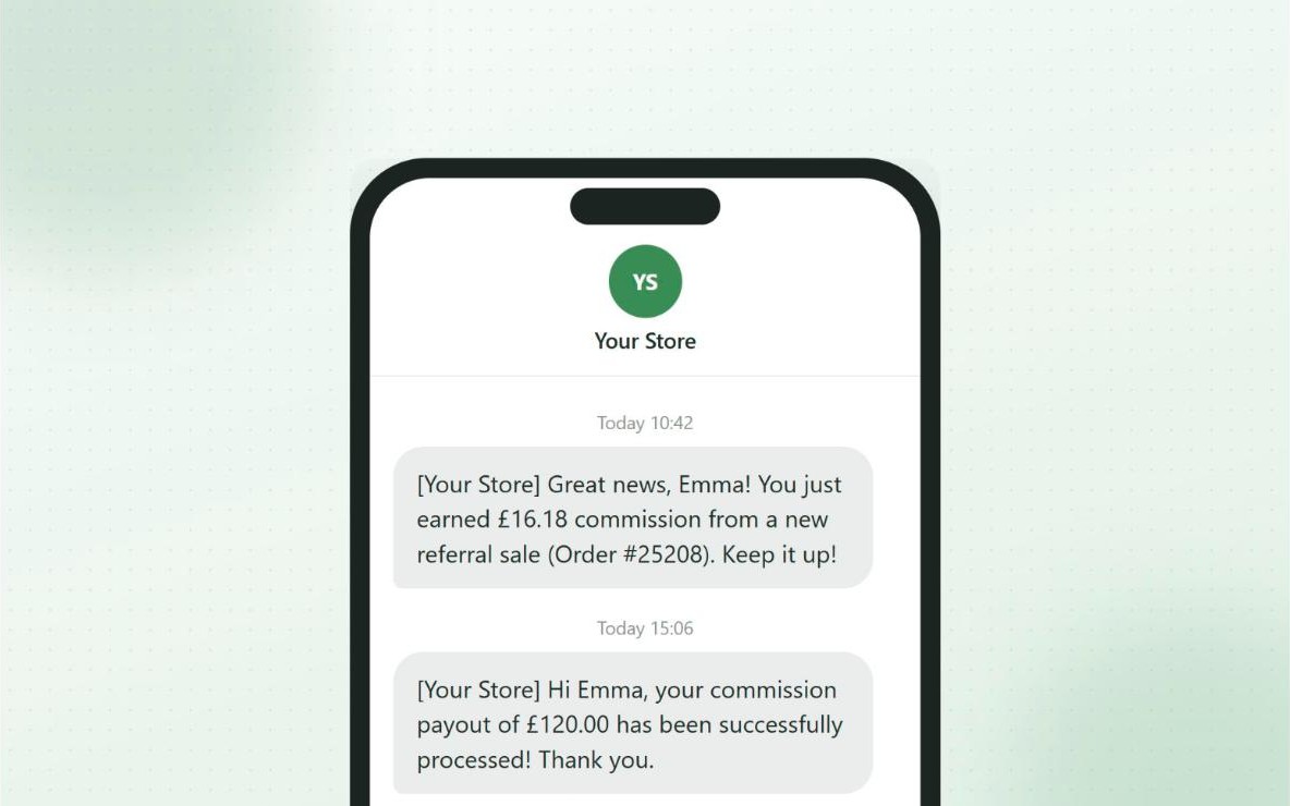 SMS notifications on a phone telling an affiliate about a new referral sale and a processed payout